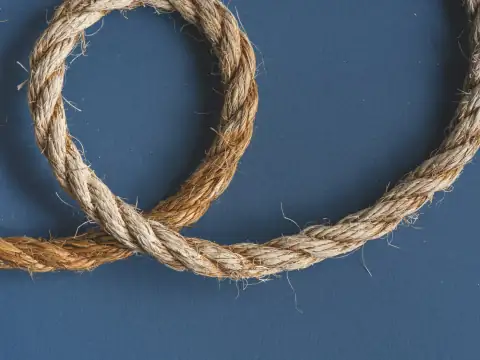 Rope: brown rope on blue textile