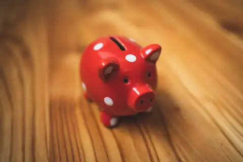 Piggy banks: pink and black ceramic piggy bank