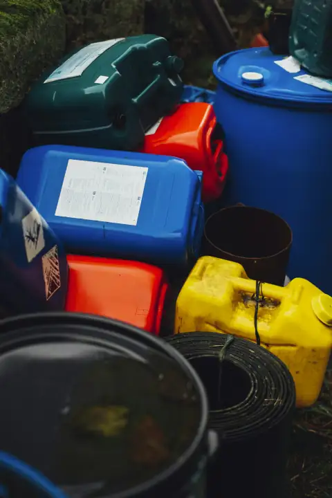 Water drums: yellow and blue plastic container