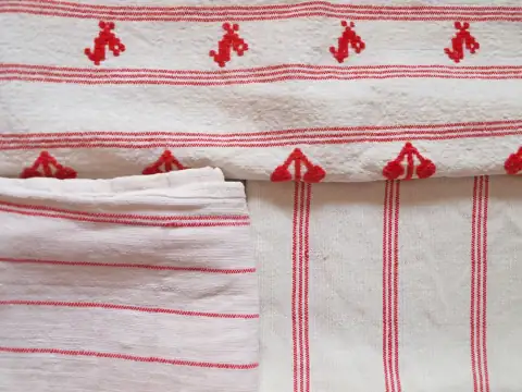Covers: a close up of two towels on a bed