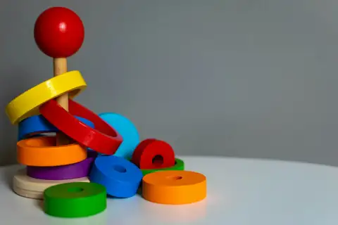 Toys: blue green yellow and red plastic toy