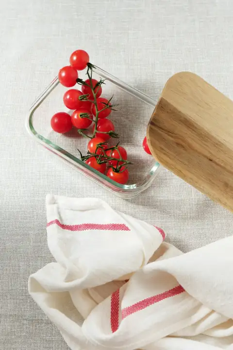 Roti rumal & napkins: a bowl of cherry tomatoes