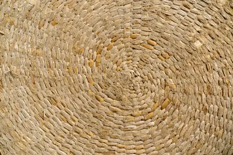 Chatai mats: Small stones arranged in a swirling spiral pattern