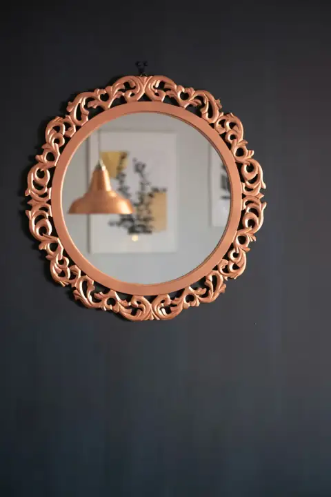 Mirrors: brass round framed mirror on black textile
