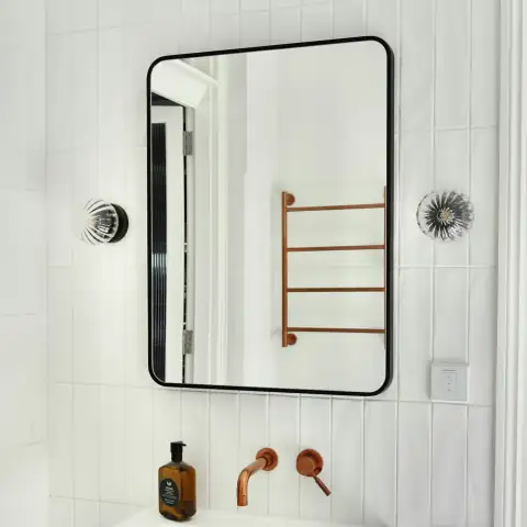 Mirrors: a mirror with a wood frame