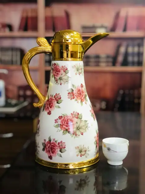 Water campers & jugs: white and pink floral ceramic pitcher