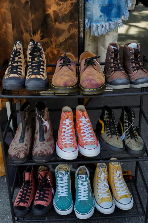 Shoe racks: several pairs of shoes are on a rack