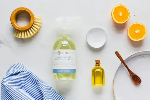 Phenyl & cleaners: clear plastic bottle on white table