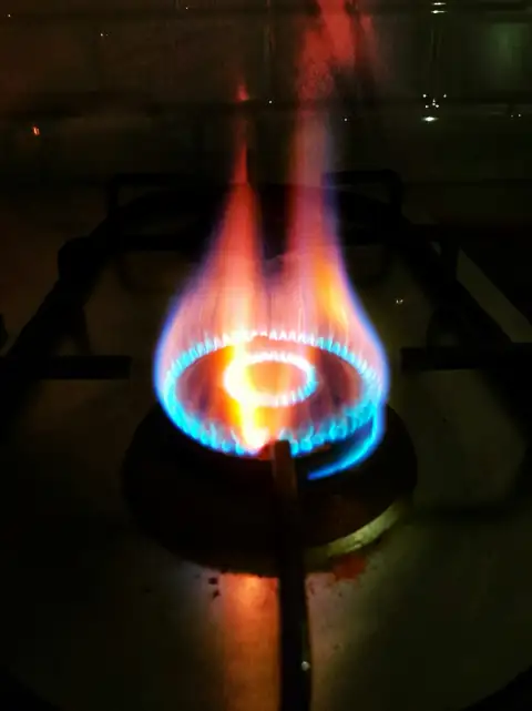 Gas lighters: blue and red flame on black metal frame